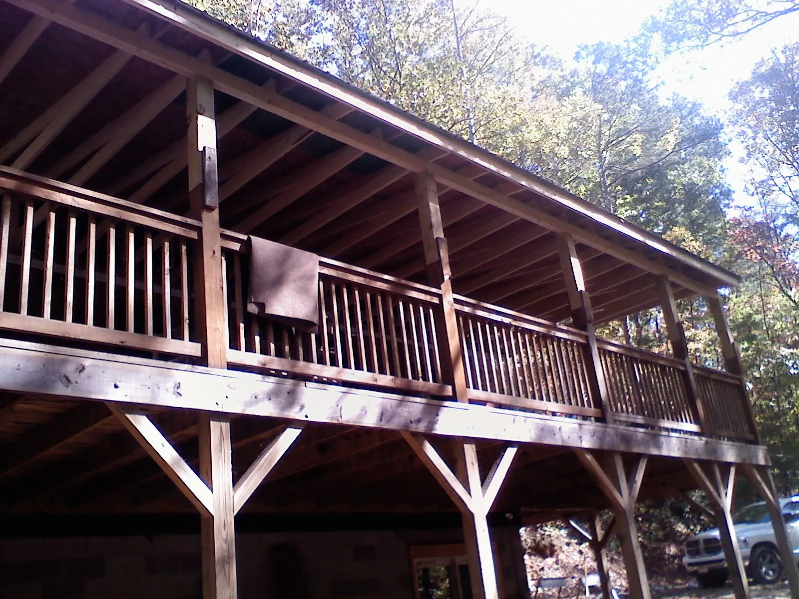 Timber framing under a new elevated porch and deck — Roof Leak Repair in Lansing by Roofing Brothers